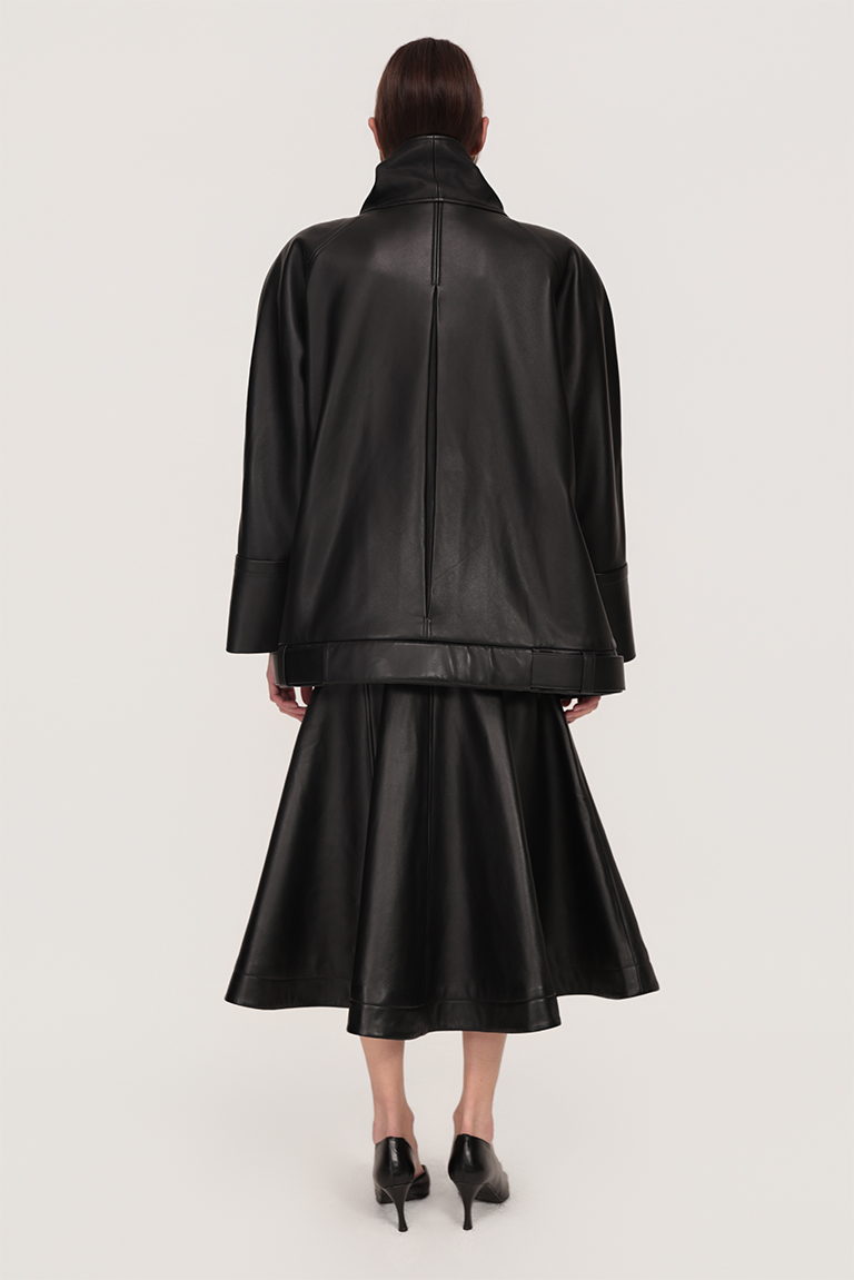 Asymmetric jacket and draped skirt